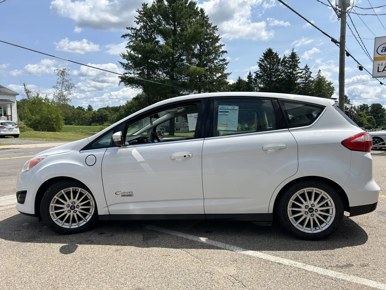 2014 Ford C-Max Énergie SEL https://www.st-norbertford.com/resize/b990ff35b810a3abc0cc817b2ca24889-1