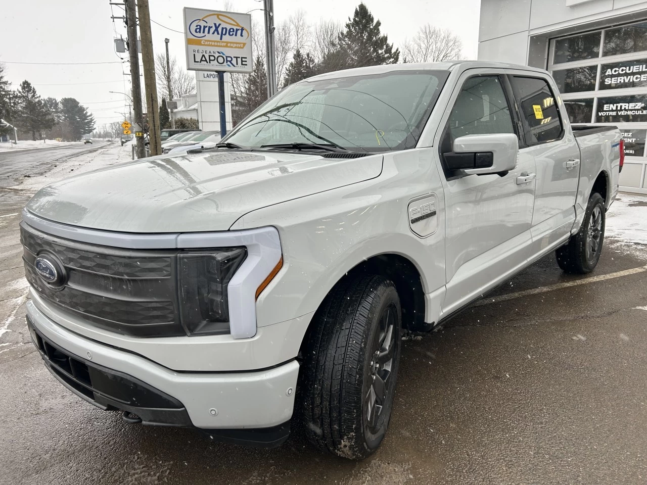 2023 Ford F-150 Lightning Lariat AWD https://www.st-norbertford.com/resize/b990ff35b810a3abc0cc817b2ca24889-1