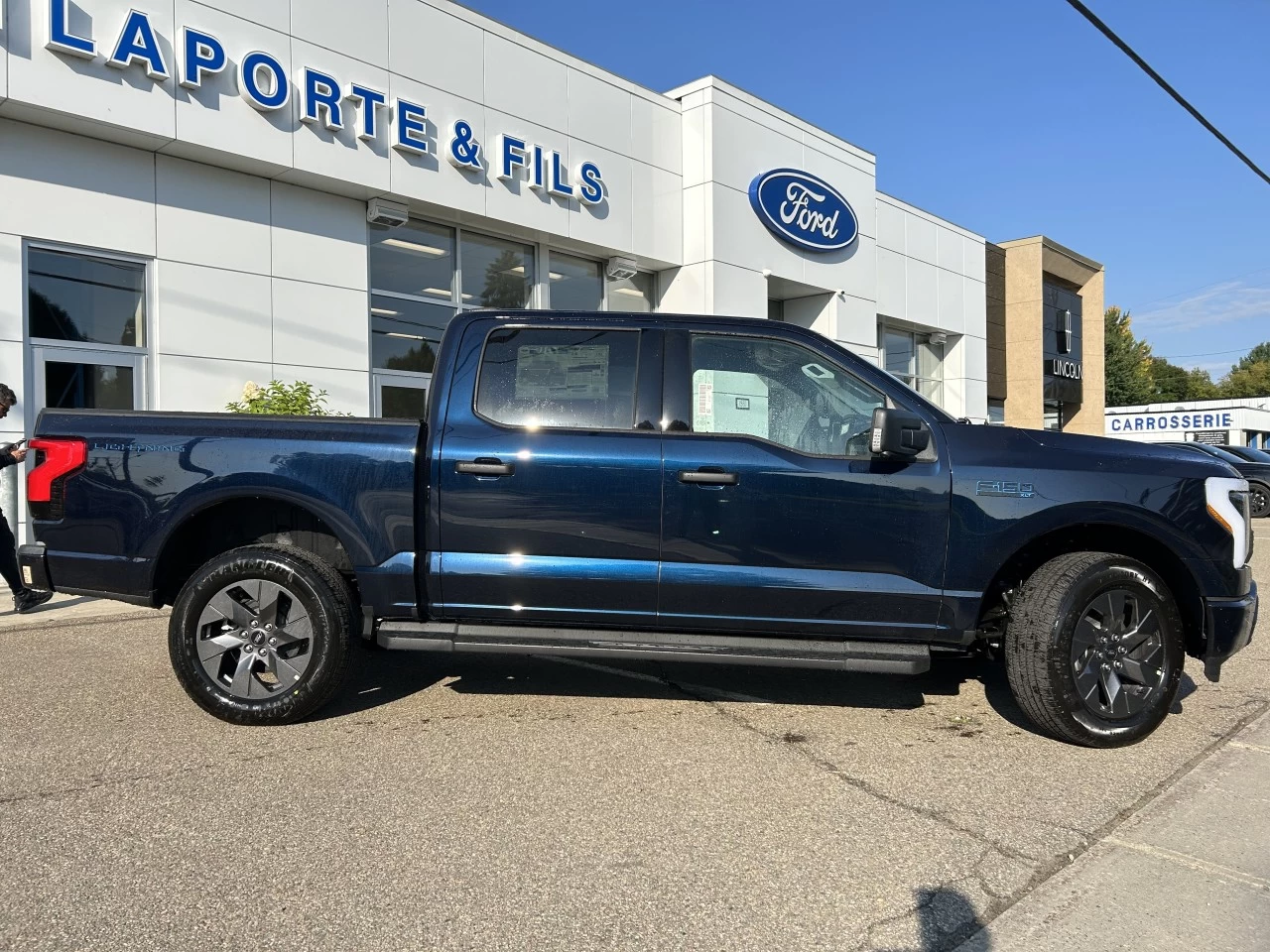 2024 Ford F-150 Lightning XLT 4x4 https://www.st-norbertford.com/resize/b990ff35b810a3abc0cc817b2ca24889-1