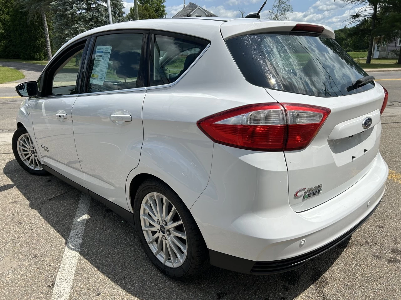 2014 Ford C-Max Énergie SEL https://www.st-norbertford.com/resize/b990ff35b810a3abc0cc817b2ca24889-1