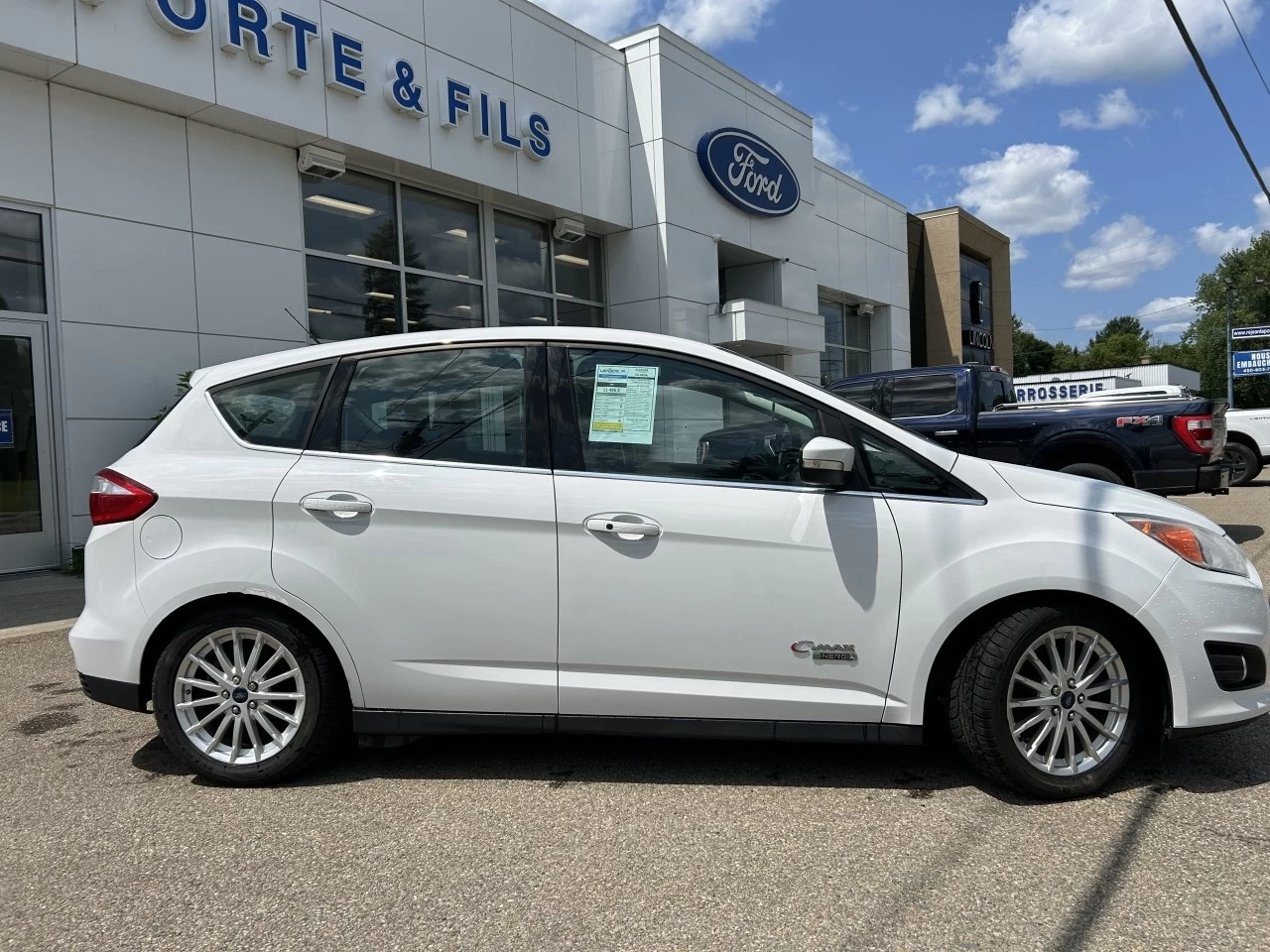 2014 Ford C-Max Énergie SEL https://www.st-norbertford.com/resize/b990ff35b810a3abc0cc817b2ca24889-1