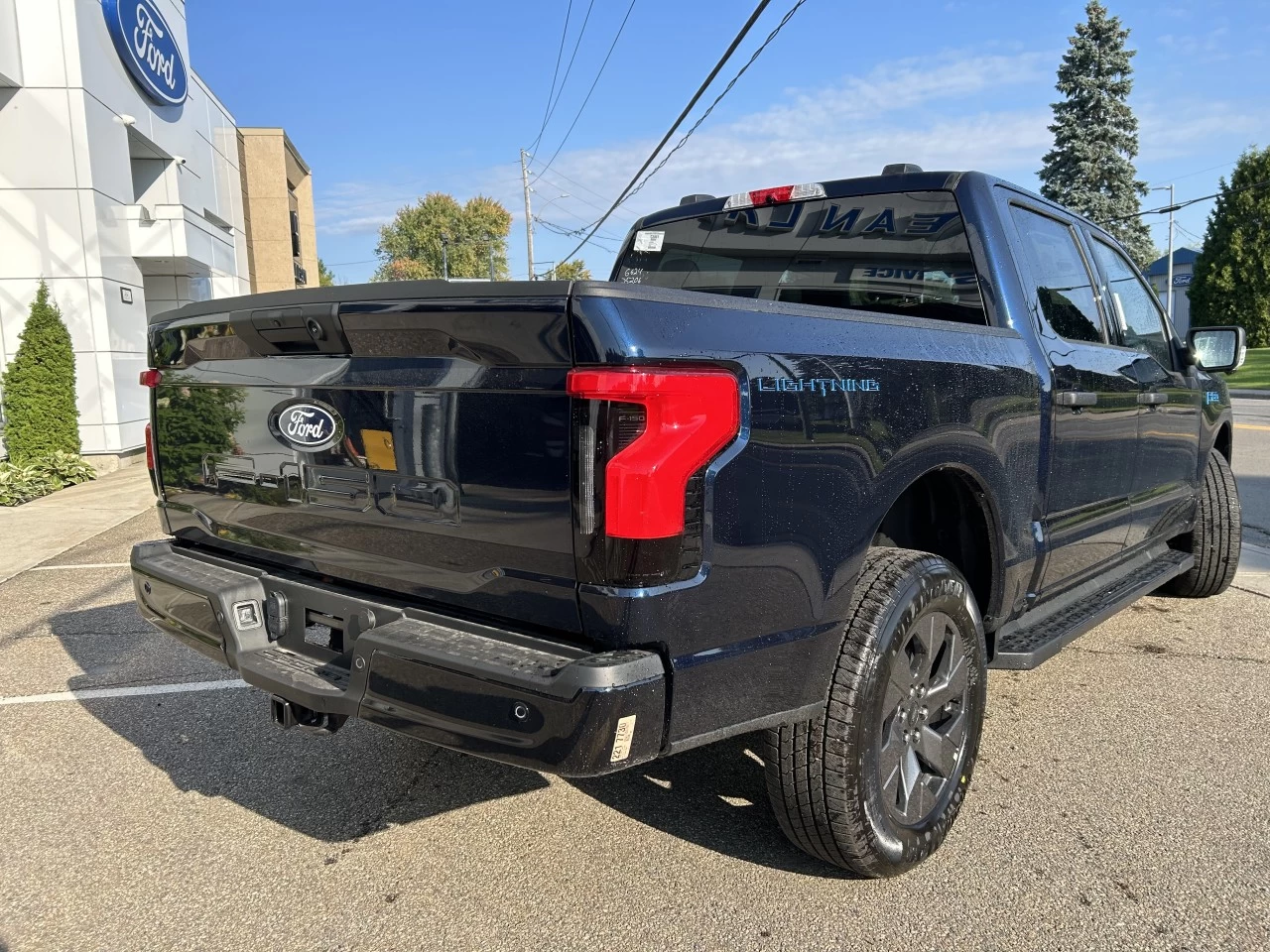 2024 Ford F-150 Lightning XLT 4x4 https://www.st-norbertford.com/resize/b990ff35b810a3abc0cc817b2ca24889-1